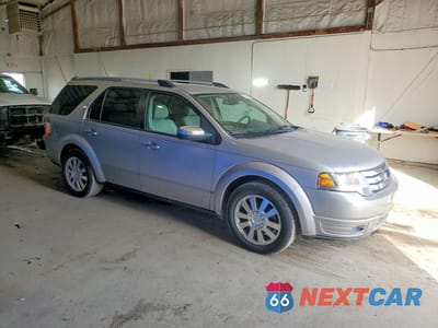 Czwarte zdjęcie samochodu z boku: 2008 FORD TAURUS X LIMITED VIN:1FMDK06W58GA21707 - miniatura