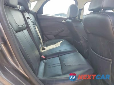 Zdjęcie 10 z 11 samochodu: 2014 FORD FOCUS TITANIUM VIN:1FADP3J21EL116950 - miniatura