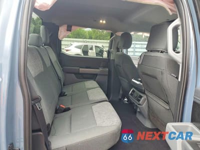 Zdjęcie 10 z 12 samochodu: 2023 FORD F150 LIGHTNING XLT VIN:1FTVW1EL6PWG12773 - miniatura