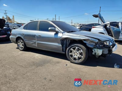 Czwarte zdjęcie samochodu z boku: 1999 ACURA 3.2TL VIN:19UUA5652XA030394 - miniatura