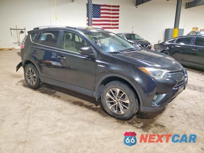 Czwarte zdjęcie samochodu z boku: 2018 TOYOTA RAV4 HYBRID XLE VIN:JTMRJREV5JD193284 - miniatura