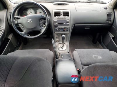 Zdjęcie 8 z 12 samochodu: 2002 NISSAN MAXIMA GXE VIN:JN1DA31D02T443593 - miniatura