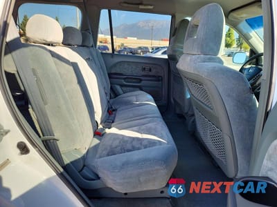 Zdjęcie 11 z 13 samochodu: 2003 HONDA PILOT EX VIN:2HKYF18403H591582 - miniatura