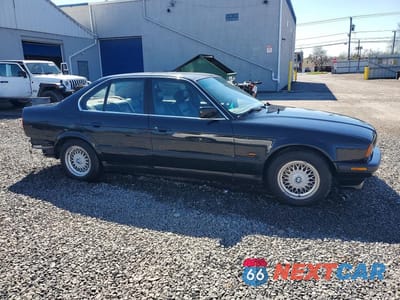 Czwarte zdjęcie samochodu z boku: 1995 BMW 525 I VIN:WBAHD5325SGB37785 - miniatura