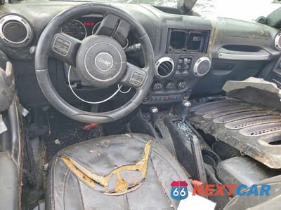 Zdjęcie 8 z 12 samochodu: 2013 JEEP WRANGLER UNLIMITED SAHARA VIN:1C4BJWEG8DL663464 - miniatura