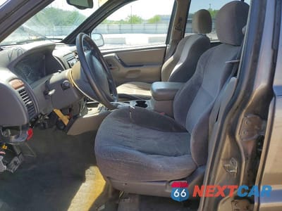 Zdjęcie 7 z 13 samochodu: 1999 JEEP GRAND CHEROKEE LAREDO VIN:1J4GW58S3XC521457 - miniatura