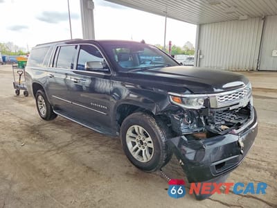 Czwarte zdjęcie samochodu z boku: 2015 CHEVROLET SUBURBAN K1500 LT VIN:1GNSKJKC6FR168415 - miniatura