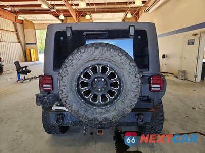 Zdjęcie 6 z 12 samochodu: 2013 JEEP WRANGLER UNLIMITED SPORT VIN:1C4BJWDG1DL506005 - miniatura