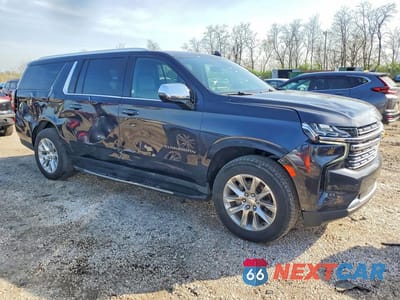Czwarte zdjęcie samochodu z boku: 2023 CHEVROLET SUBURBAN C1500 PREMIER VIN:1GNSCFKD8PR394881 - miniatura