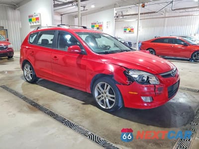 Czwarte zdjęcie samochodu z boku: 2012 HYUNDAI ELANTRA TOURING SE VIN:KMHDC8AE9CU127310 - miniatura