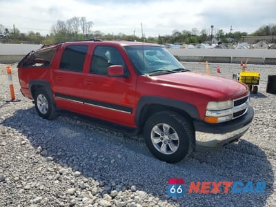 Czwarte zdjęcie samochodu z boku: 2001 CHEVROLET SUBURBAN K1500 VIN:3GNFK16T21G190660 - miniatura