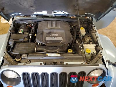 Zdjęcie 11 z 13 samochodu: 2012 JEEP WRANGLER SAHARA VIN:1C4AJWBG5CL174390 - miniatura