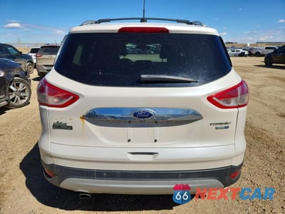 Zdjęcie 6 z 13 samochodu: 2014 FORD ESCAPE TITANIUM VIN:1FMCU9J92EUD90033 - miniatura