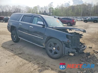 Czwarte zdjęcie samochodu z boku: 2015 CHEVROLET SUBURBAN K1500 LT VIN:1GNSKJKC0FR747352 - miniatura