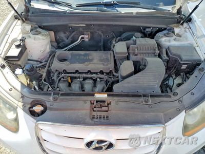 Zdjęcie 12 z 13 samochodu: 2010 HYUNDAI SANTA FE GLS VIN:5NMSG3AB6AH336579 - miniatura