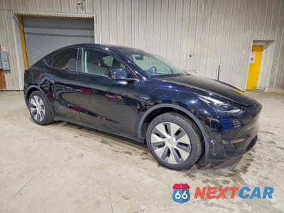 Czwarte zdjęcie samochodu z boku: 2023 TESLA MODEL Y VIN:7SAYGDEE9PA187003 - miniatura