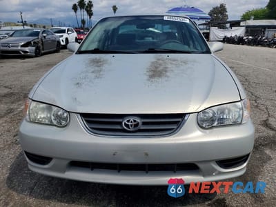 Piąte zdjęcie samochodu w środku: 2001 TOYOTA COROLLA LE VIN:1NXBR12E01Z501263 - miniatura