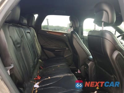 Zdjęcie 11 z 13 samochodu: 2017 LINCOLN MKC SELECT VIN:5LMCJ2D96HUL08138 - miniatura