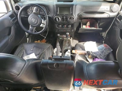 Zdjęcie 8 z 11 samochodu: 2018 JEEP WRANGLER UNLIMITED SAHARA VIN:1C4HJWEGXJL889768 - miniatura