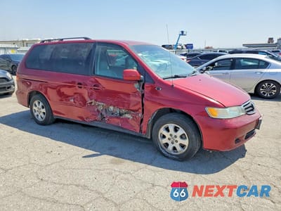Czwarte zdjęcie samochodu z boku: 2004 HONDA ODYSSEY EXL VIN:5FNRL18994B070451 - miniatura