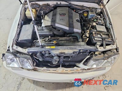 Zdjęcie 12 z 13 samochodu: 2000 LEXUS LX 470 VIN:JT6HT00WXY0125735 - miniatura