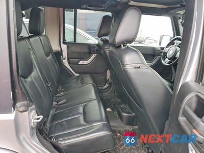 Zdjęcie 10 z 11 samochodu: 2013 JEEP WRANGLER UNLIMITED SAHARA VIN:1C4HJWEG8DL571605 - miniatura