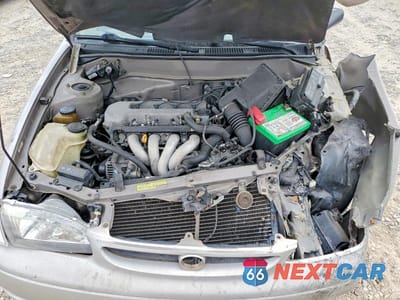 Zdjęcie 12 z 14 samochodu: 1999 TOYOTA COROLLA VE VIN:1NXBR12E9XZ295109 - miniatura