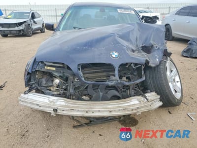 Piąte zdjęcie samochodu w środku: 2004 BMW 325 I VIN:WBAET37454NJ46889 - miniatura