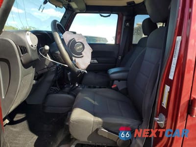 Zdjęcie 7 z 11 samochodu: 2012 JEEP WRANGLER UNLIMITED SAHARA VIN:1C4BJWEG6CL157078 - miniatura