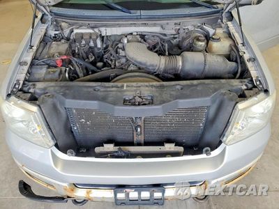 Zdjęcie 11 z 12 samochodu: 2005 FORD F150 VIN:1FTRX14W35FB57906 - miniatura