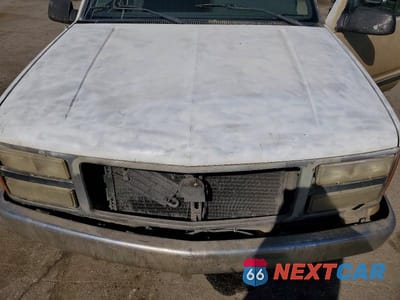 Zdjęcie 11 z 12 samochodu: 1990 GMC SIERRA C1500 VIN:1GTDC14K5LZ518826 - miniatura
