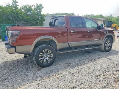 Trzecie zdjęcie samochodu z tyłu: 2017 NISSAN TITAN XD PLATINUM RESERVE VIN:1N6BA1F40HN548548 - miniatura