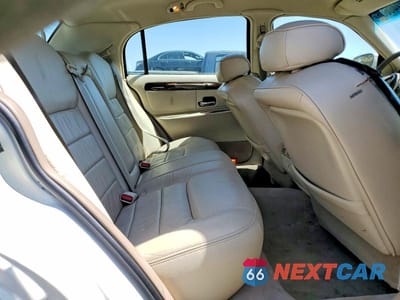 Zdjęcie 10 z 11 samochodu: 2000 LINCOLN TOWN CAR EXECUTIVE VIN:1LNHM81WXYY935382 - miniatura
