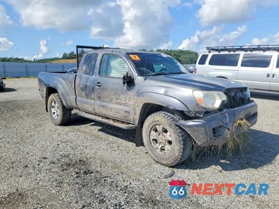 Czwarte zdjęcie samochodu z boku: 2014 TOYOTA TACOMA V6 VIN:5TFUU4EN7EX091607 - miniatura