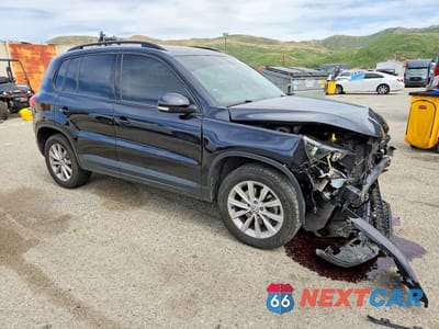 Czwarte zdjęcie samochodu z boku: 2017 VOLKSWAGEN TIGUAN S VIN:WVGAV7AX3HK053989 - miniatura