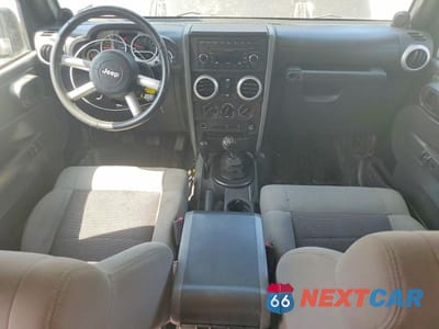 Zdjęcie 8 z 13 samochodu: 2010 JEEP WRANGLER UNLIMITED SAHARA VIN:1J4BA5H10AL163788 - miniatura