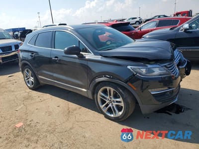 Czwarte zdjęcie samochodu z boku: 2015 LINCOLN MKC VIN:5LMCJ2A9XFUJ47388 - miniatura