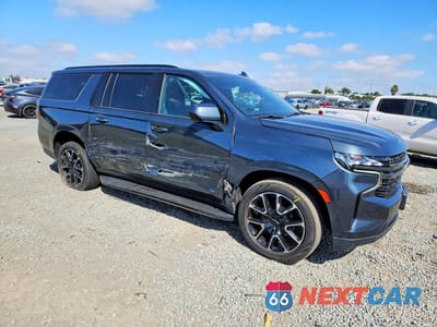 Czwarte zdjęcie samochodu z boku: 2021 CHEVROLET SUBURBAN C1500 RST VIN:1GNSCEKD3MR363625 - miniatura