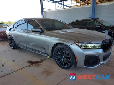 Czwarte zdjęcie samochodu z boku: 2022 BMW 750 XI VIN:WBA7U2C06NCJ35805 - miniatura