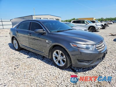 Czwarte zdjęcie samochodu z boku: 2017 FORD TAURUS SEL VIN:1FAHP2H81HG111654 - miniatura