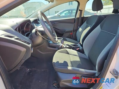 Zdjęcie 7 z 12 samochodu: 2013 FORD FOCUS S VIN:1FADP3E27DL320662 - miniatura