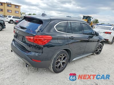 Trzecie zdjęcie samochodu z tyłu: 2018 BMW X1 SDRIVE28I VIN:WBXHU7C39J5L07826 - miniatura