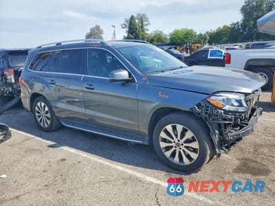 Czwarte zdjęcie samochodu z boku: 2018 MERCEDES-BENZ GLS 450 4MATIC VIN:4JGDF6EE2JB173611 - miniatura