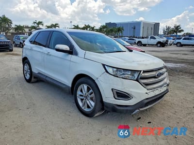 Czwarte zdjęcie samochodu z boku: 2015 FORD EDGE SEL VIN:2FMTK3J92FBB21380 - miniatura