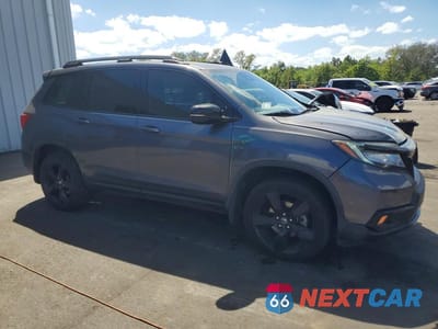 Czwarte zdjęcie samochodu z boku: 2019 HONDA PASSPORT ELITE VIN:5FNYF8H03KB030778 - miniatura