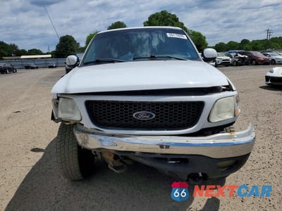 Piąte zdjęcie samochodu w środku: 2002 FORD F150 VIN:1FTRX18W62NA55852 - miniatura