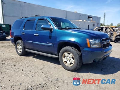 Czwarte zdjęcie samochodu z boku: 2007 CHEVROLET TAHOE K1500 VIN:1GNFK13007J247956 - miniatura