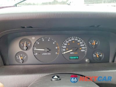 Zdjęcie 9 z 11 samochodu: 1999 JEEP GRAND CHEROKEE LIMITED VIN:1J4GW68S3XC615263 - miniatura