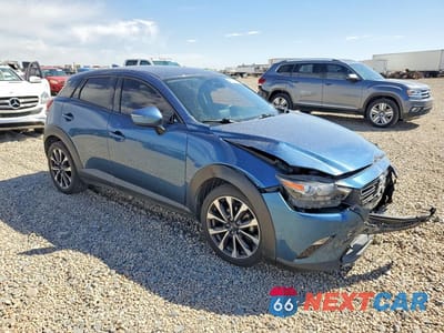 Czwarte zdjęcie samochodu z boku: 2019 MAZDA CX-3 TOURING VIN:JM1DKDC74K1456639 - miniatura