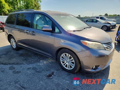 Czwarte zdjęcie samochodu z boku: 2014 TOYOTA SIENNA XLE 8-PASSENGER VIN:5TDYK3DC6ES518024 - miniatura